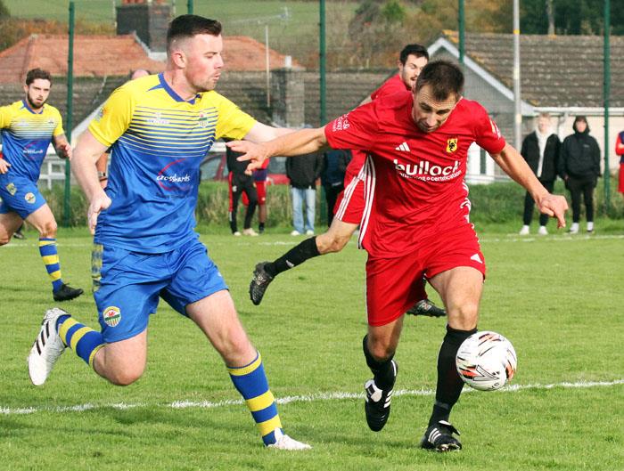 Goal scorer Marcus Griffiths in action for Carew v Bryn Rovers in the West  Wales Intermediate Cup. Picture Susan McKehon
